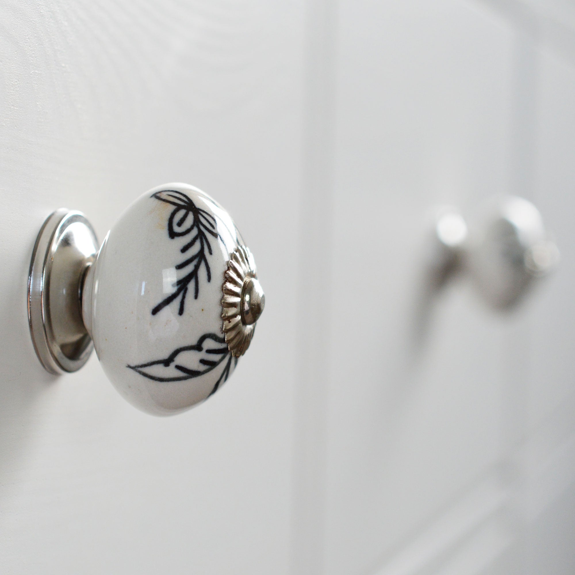Round Ceramic Drawer Knob - Black / White Leaves